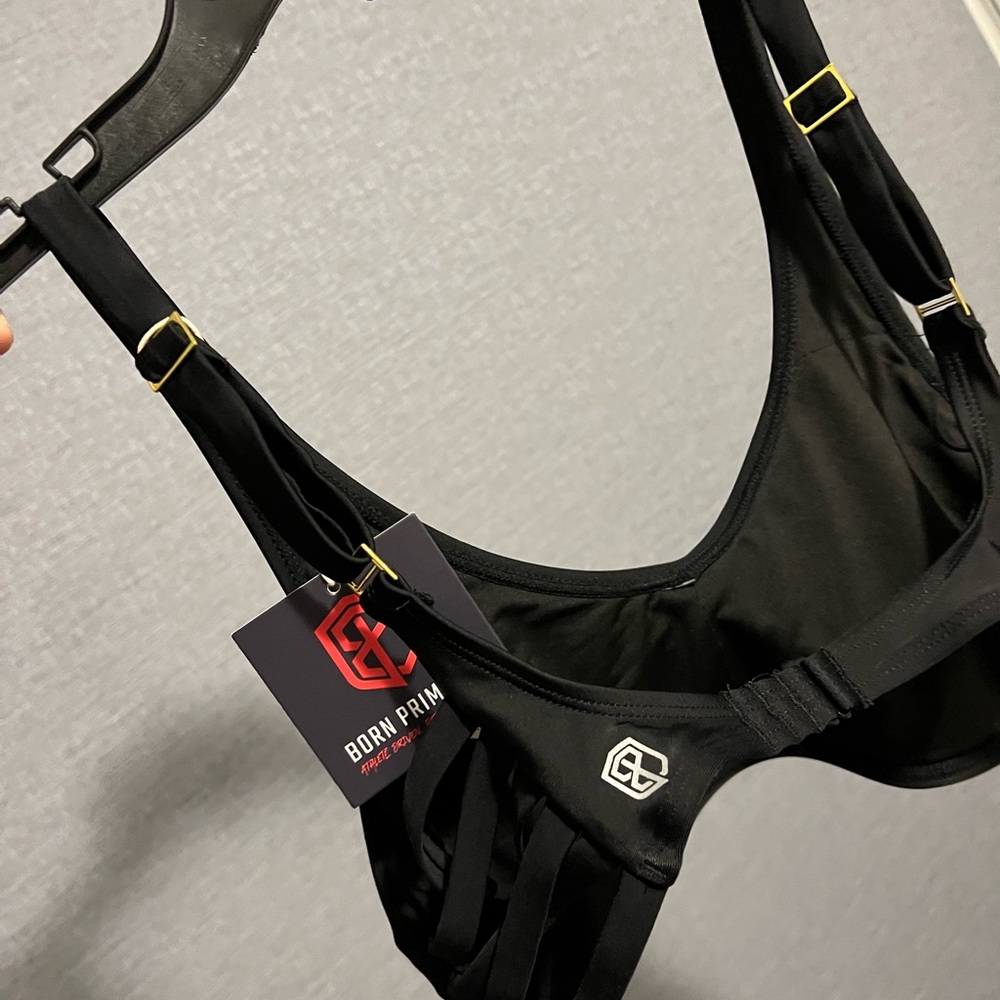 Born primitive bathing suit top. New with tags. Paid $40.